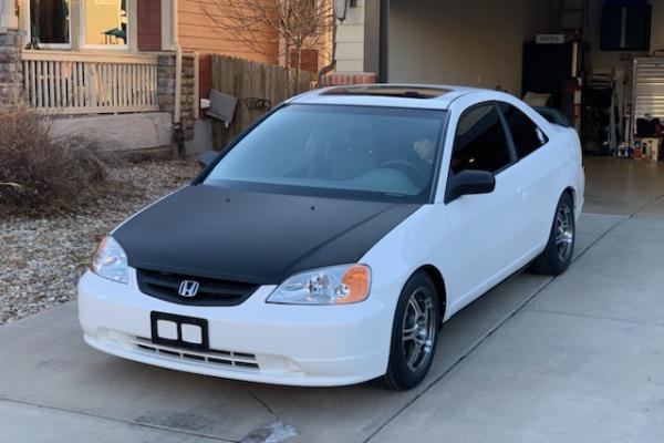 Honda with Carbon Fiber wrap on the hood and spoiler
